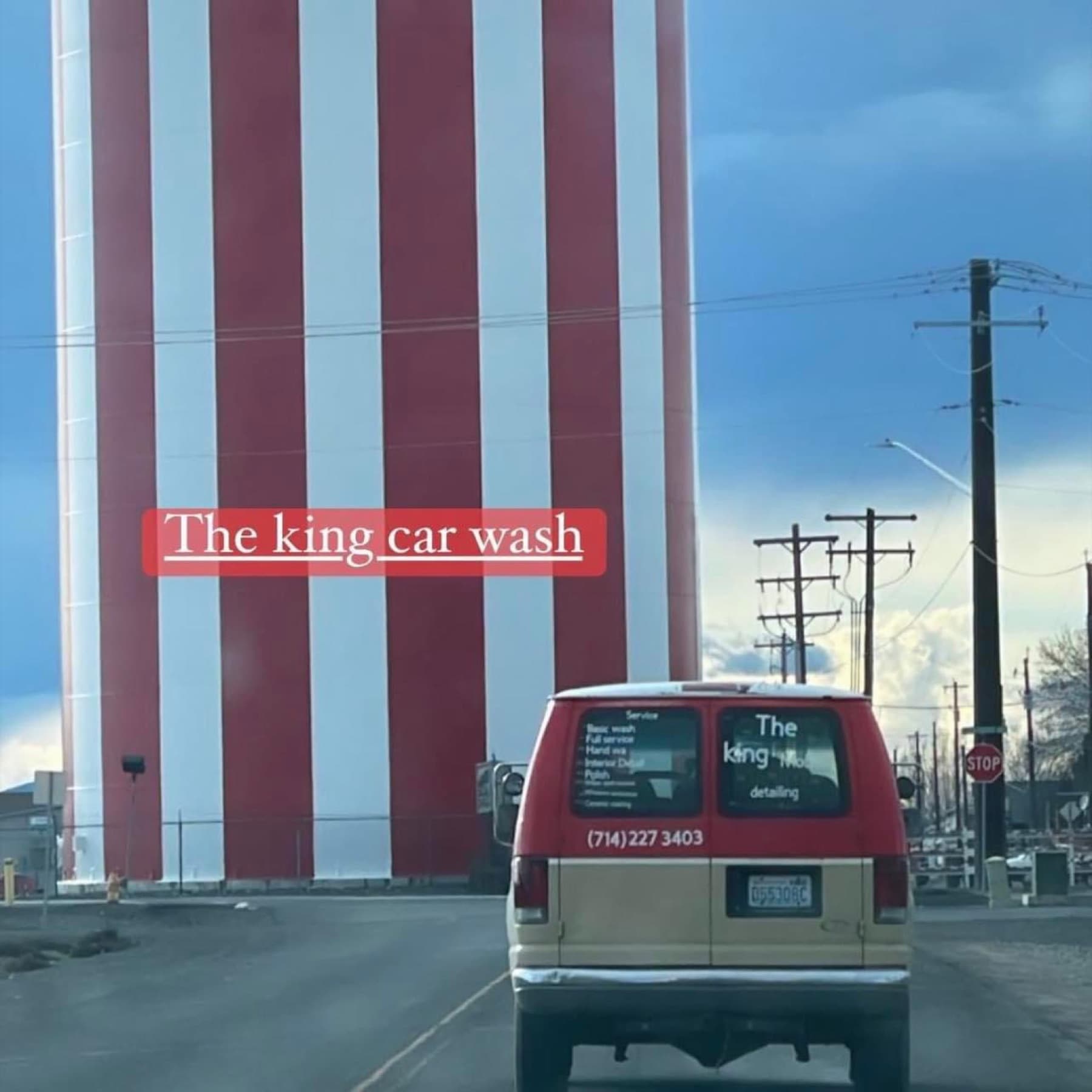 King Detail mobile route proof near a red and white Othello building with the service van visible.
